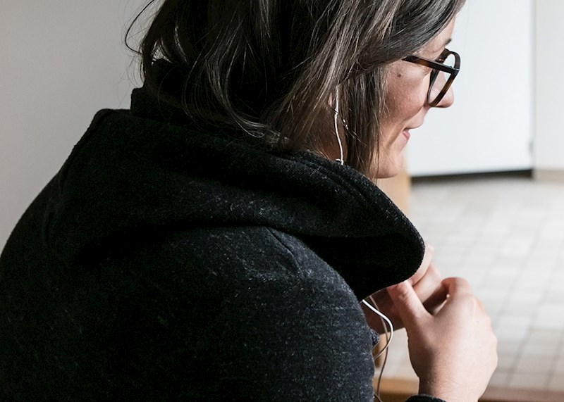 Woman video chatting on a laptop