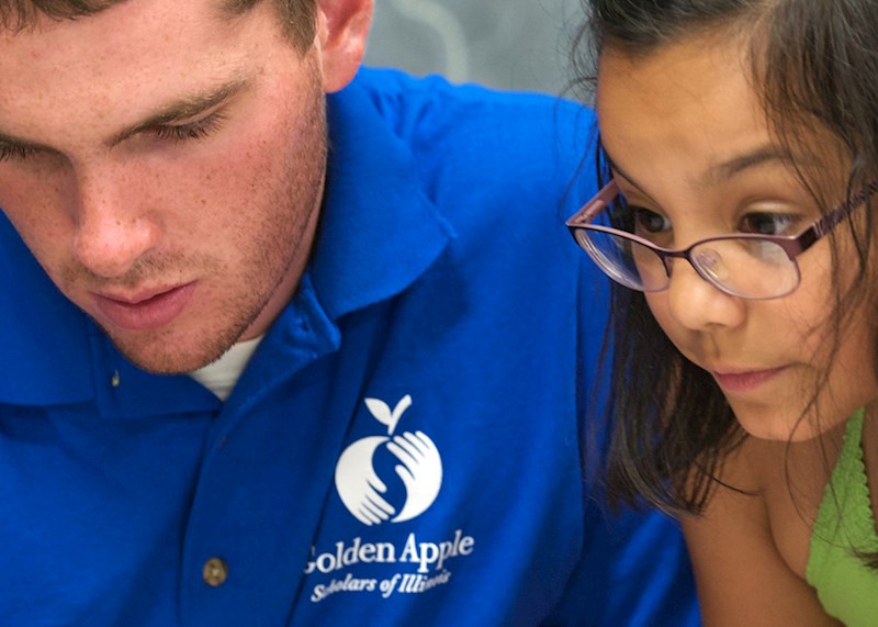 Golden Apple volunteer and student