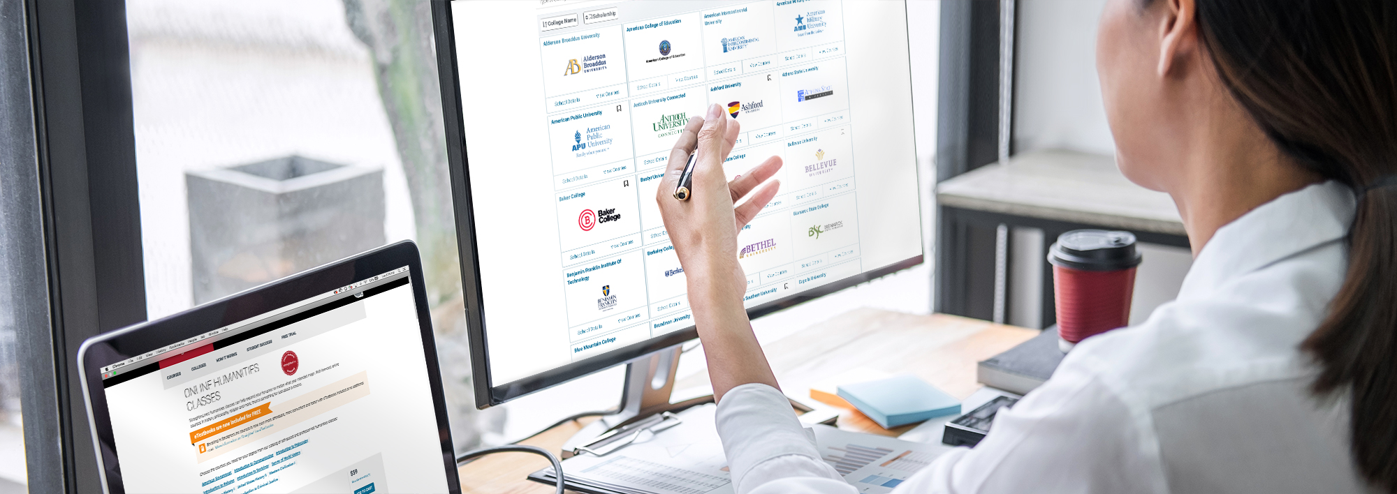 Woman working in front of a computer screen