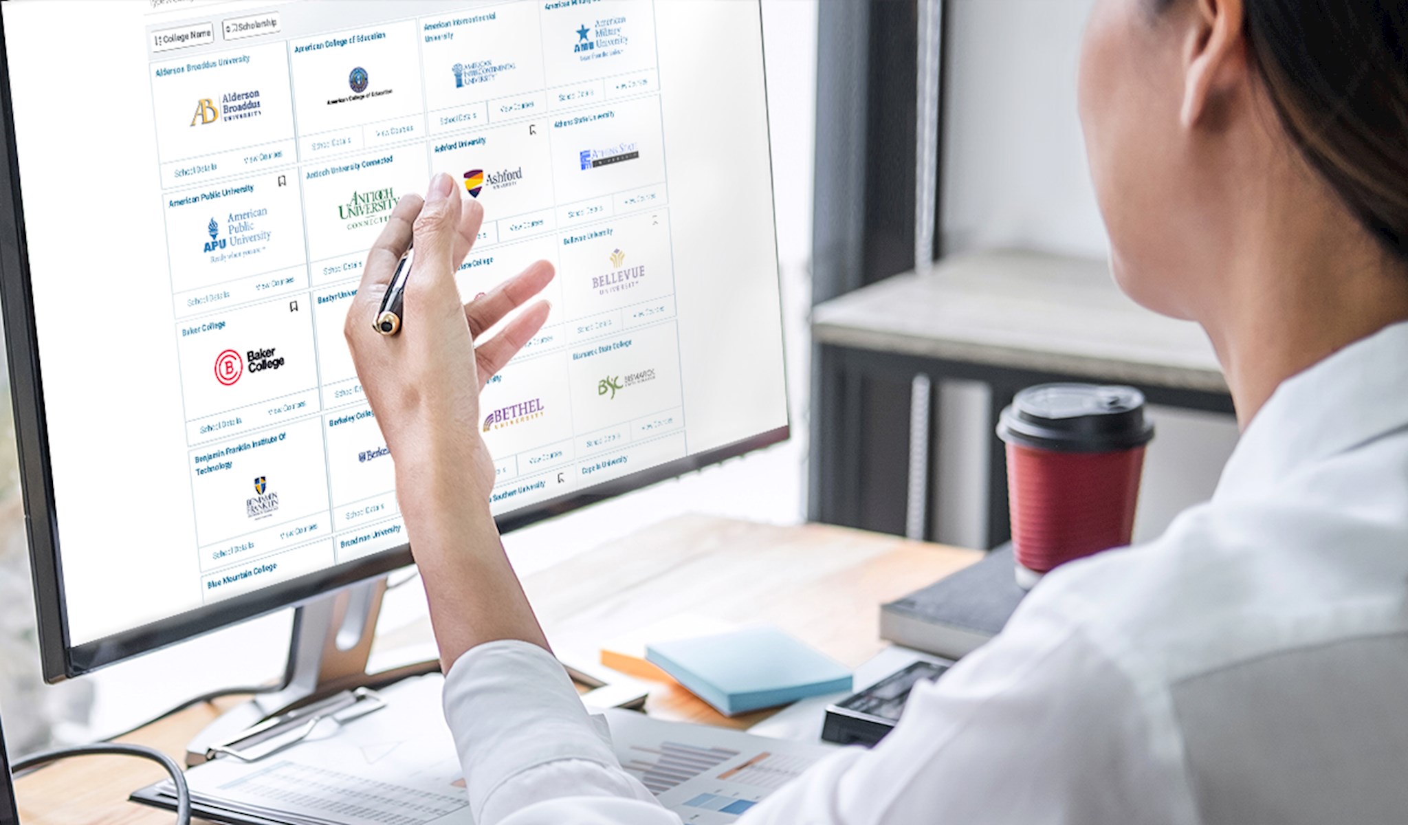 Woman working in front of a computer screen