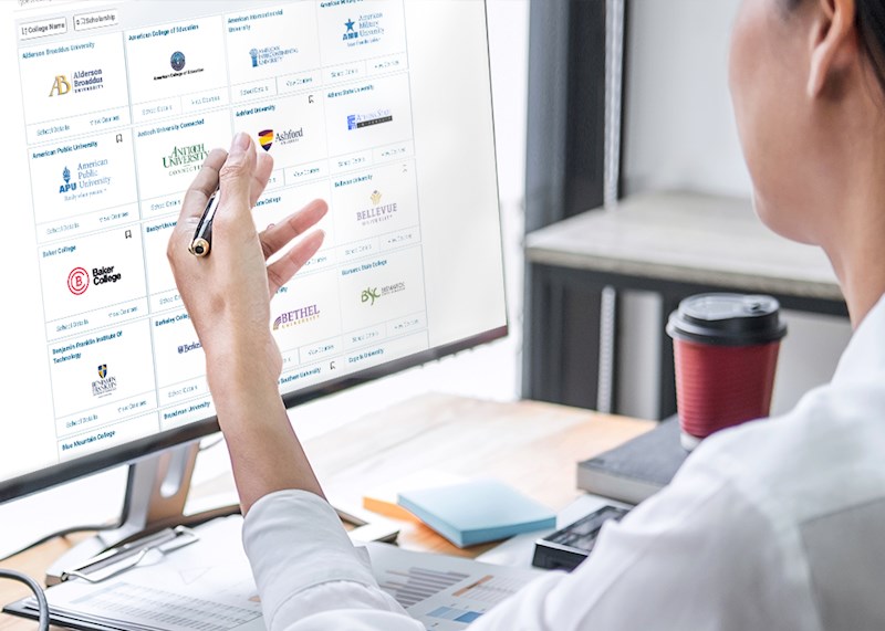 Woman working in front of a computer screen
