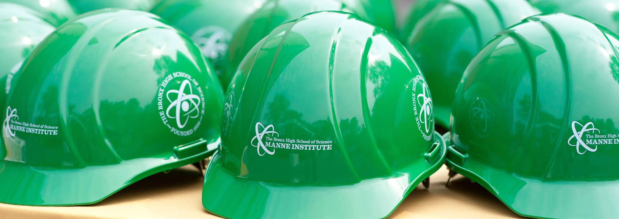 Green construction worker helmets