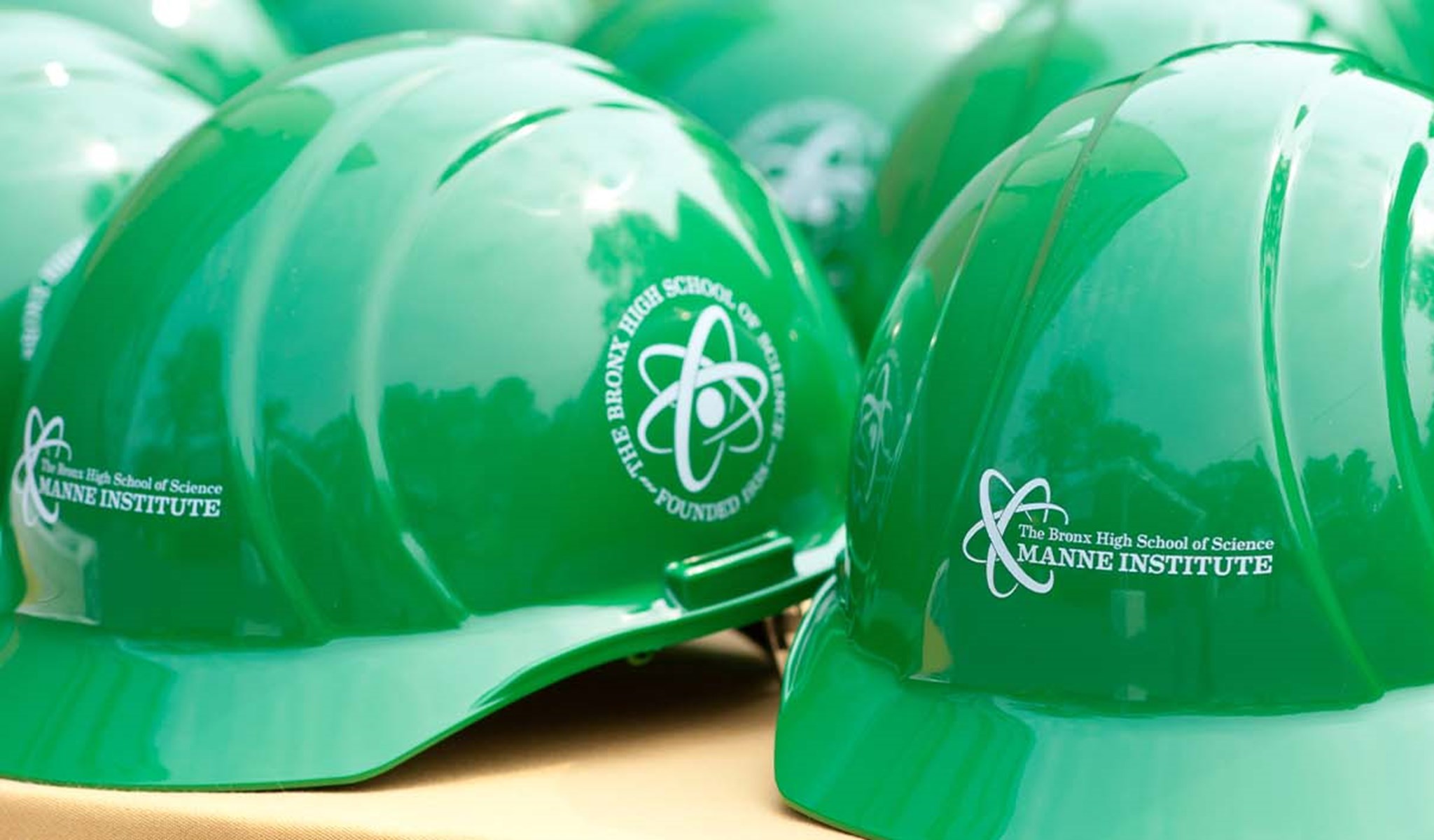 Green construction worker helmets