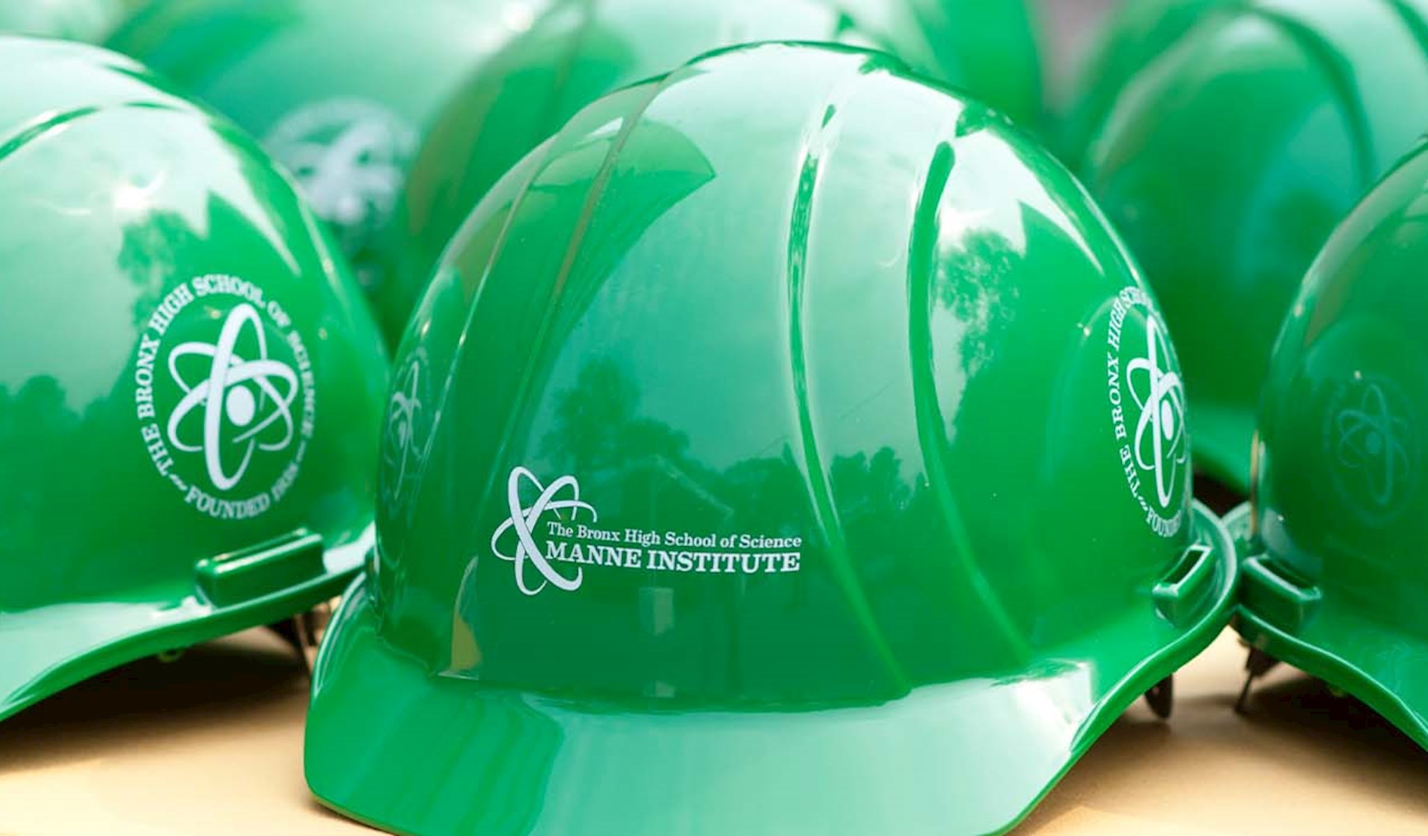 Green construction worker helmets