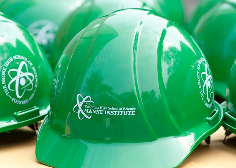 Green construction worker helmets