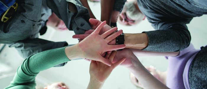 Hands in a huddle