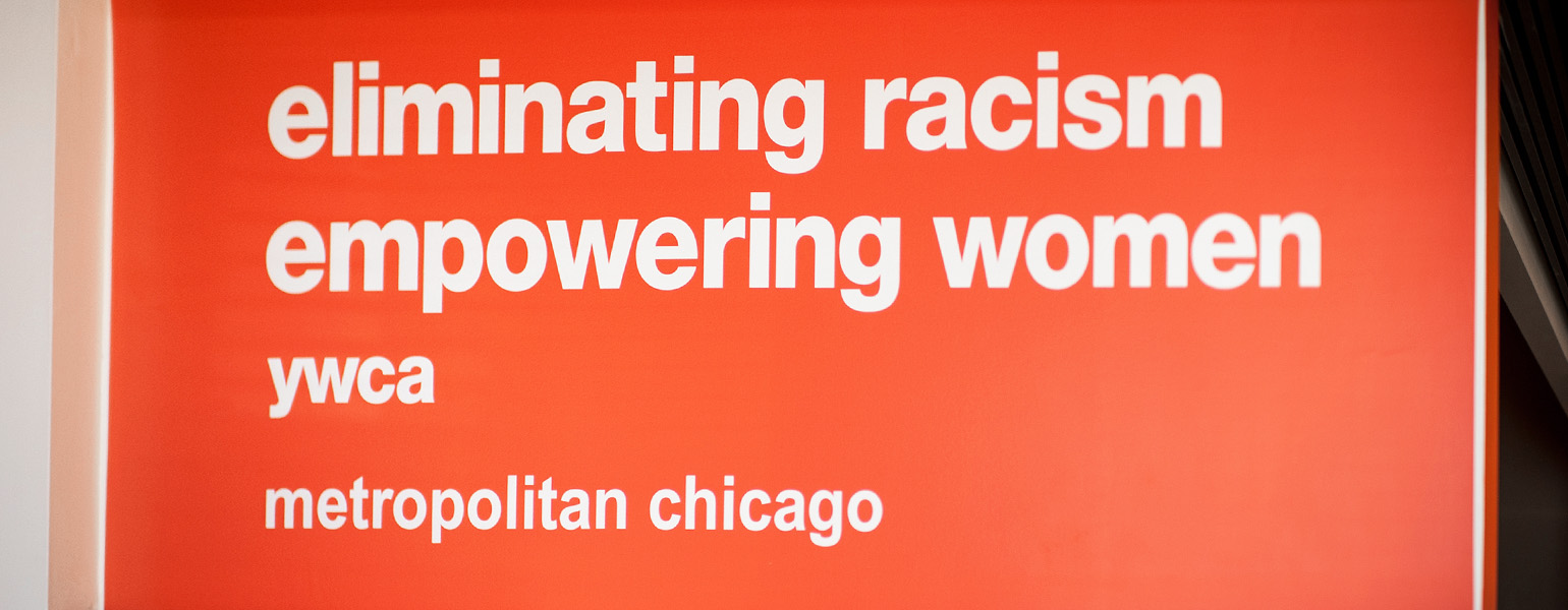 Sign that says "eliminating racism, empowering women, ywca, metropolitan chicago"