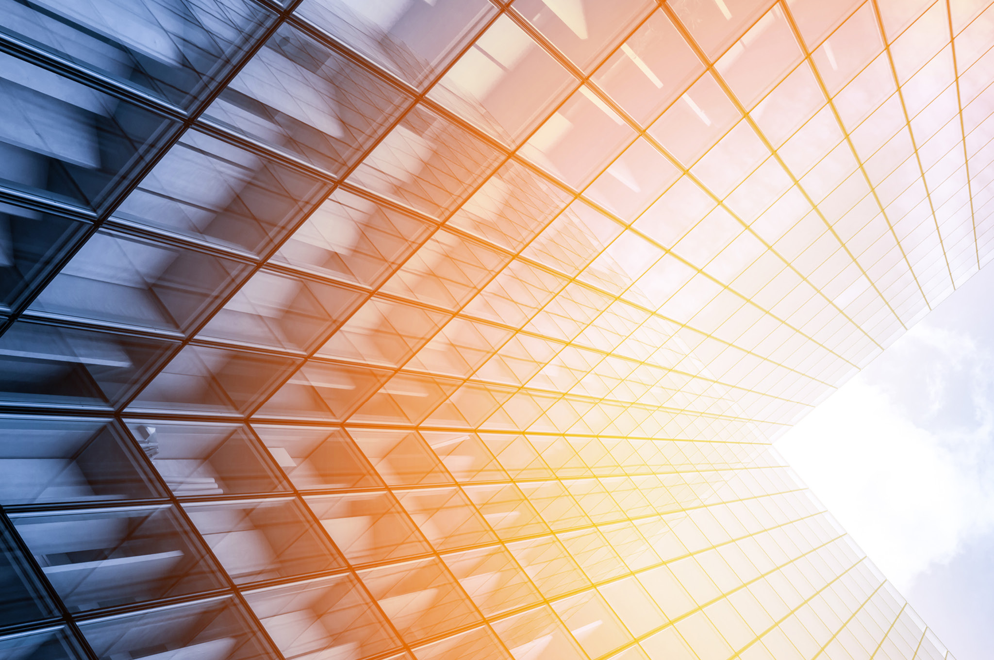 Looking up a building courtyard with sun pouring in