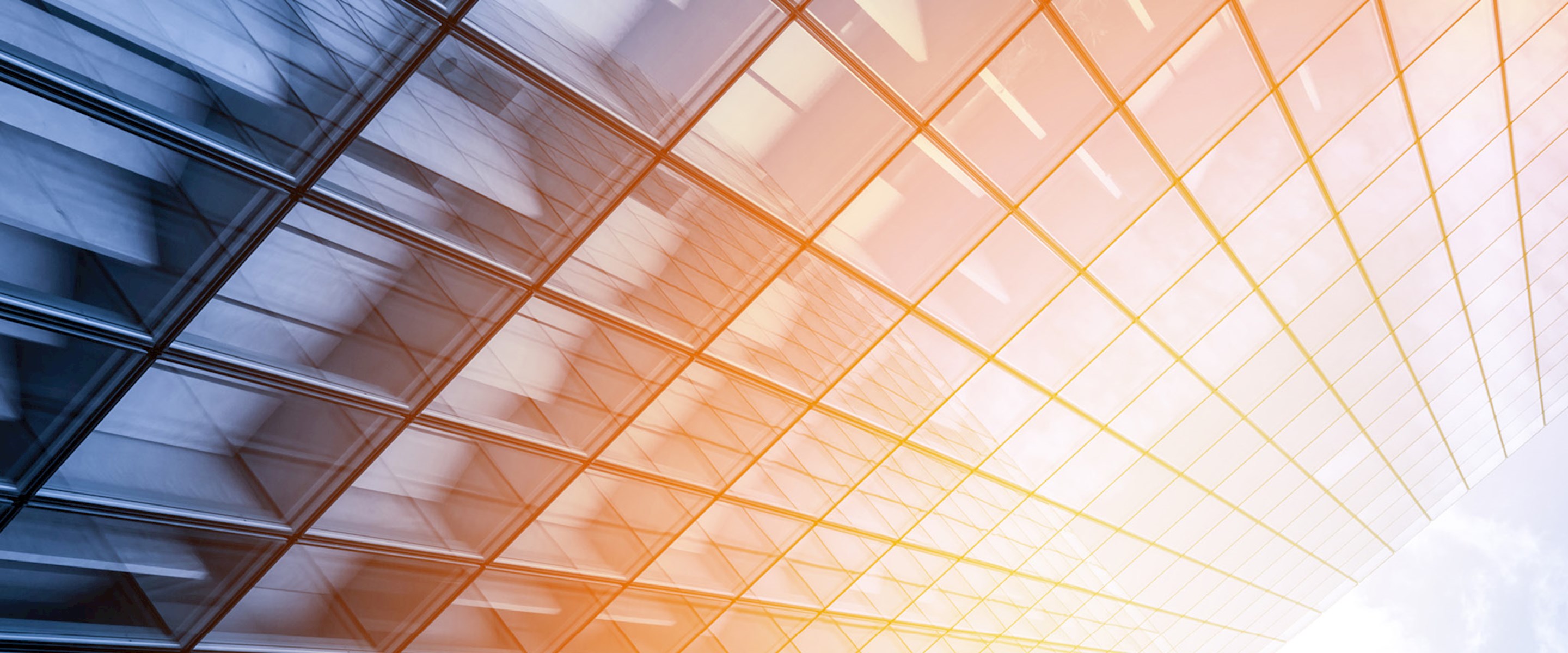 Looking up a building courtyard with sun pouring in
