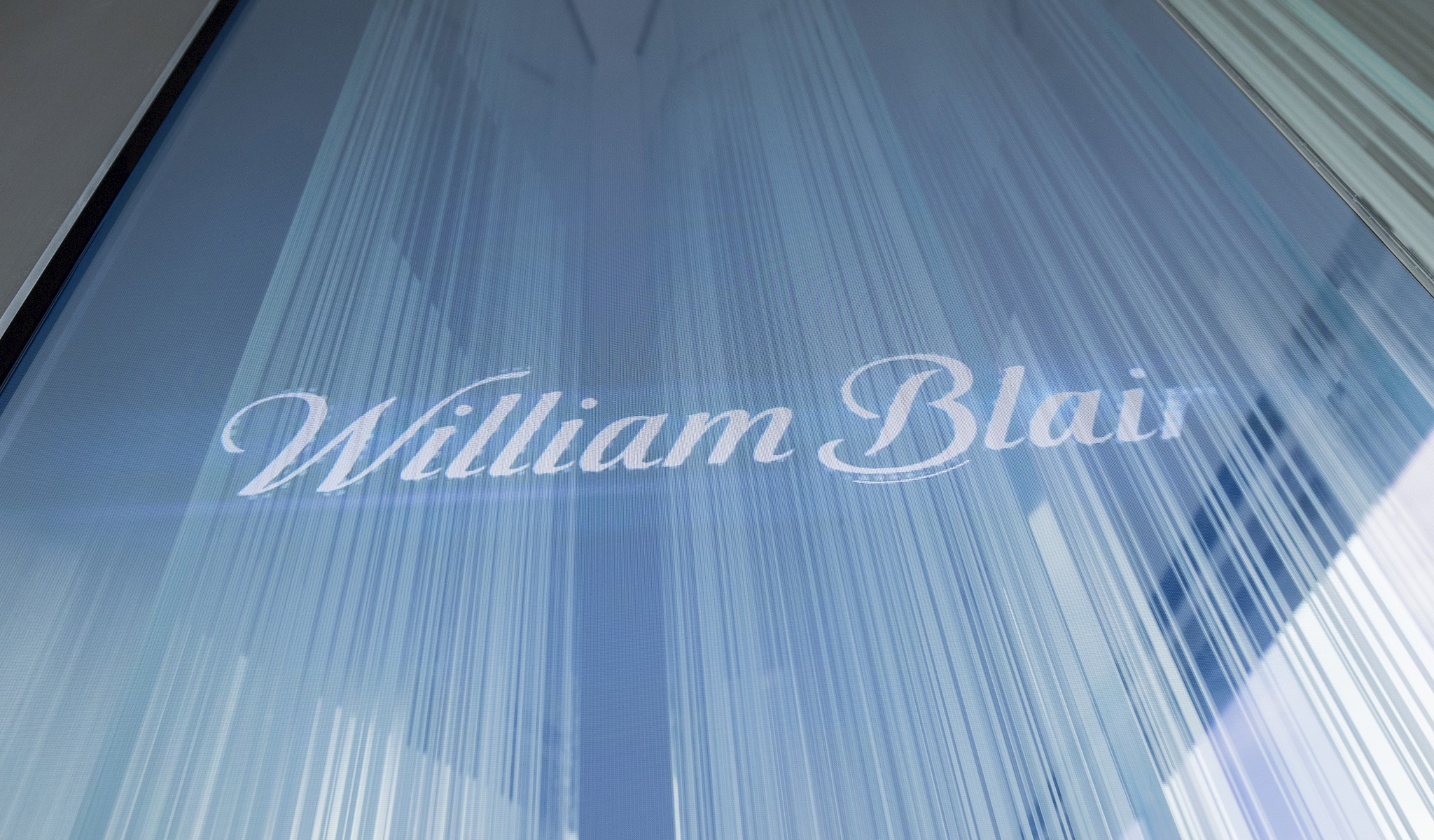 William Blair logo etched on a glass wall