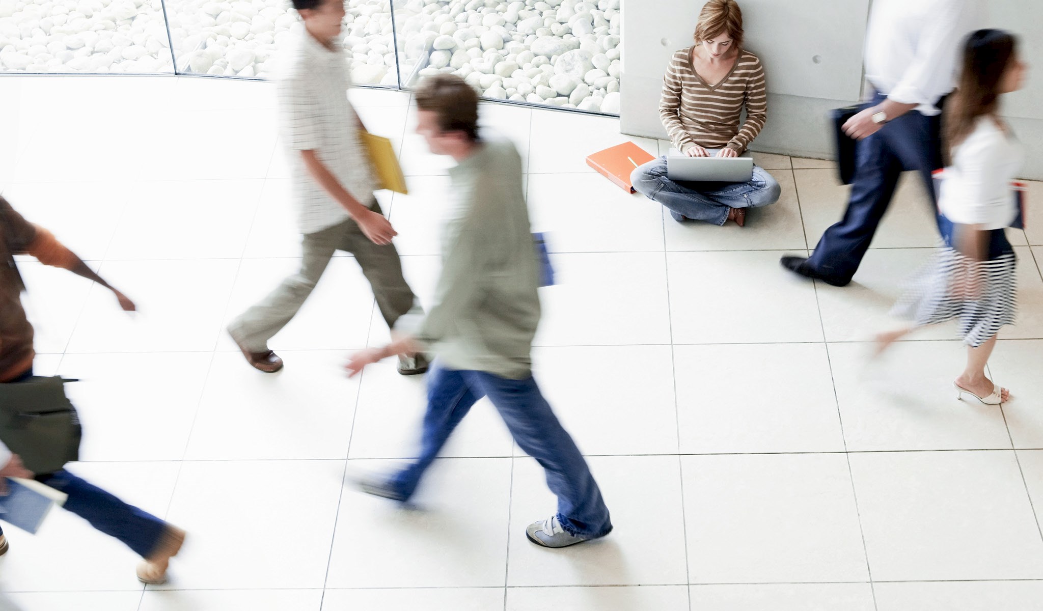 College kids in a hallway