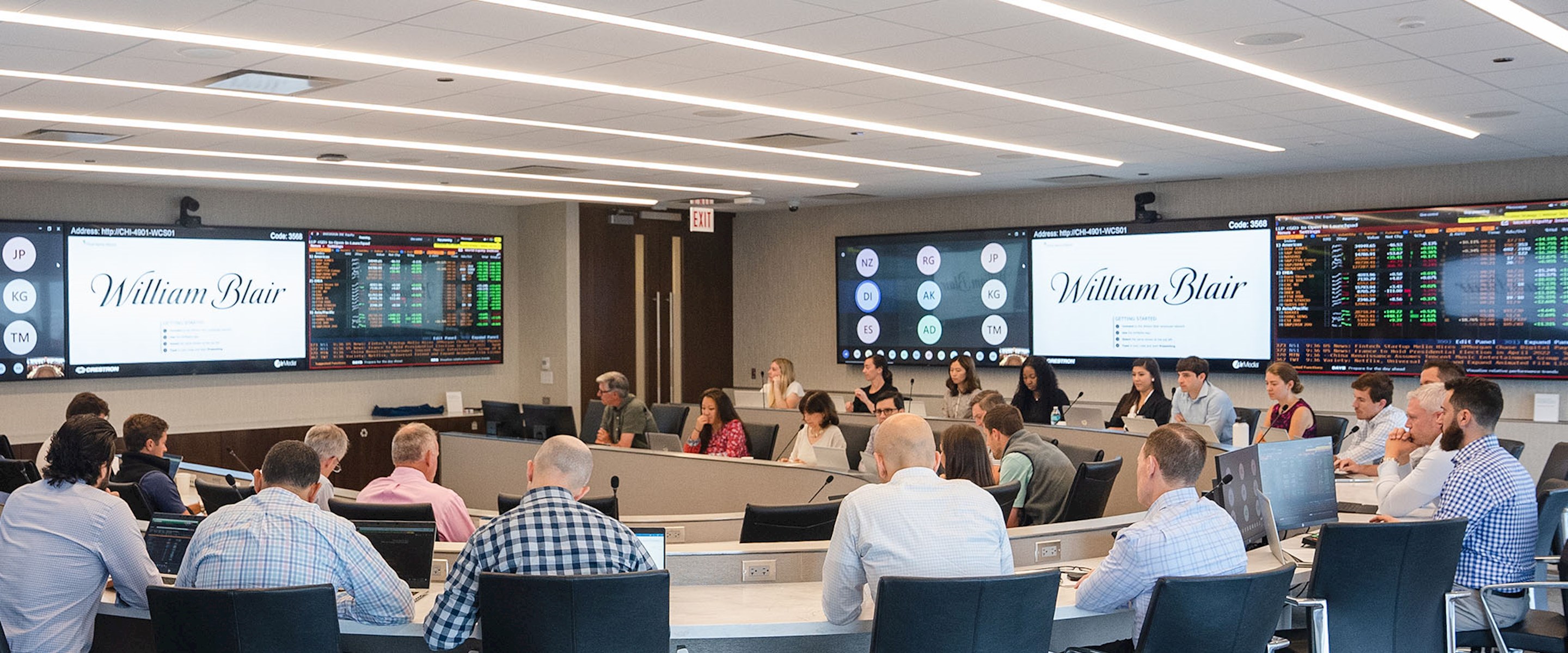 William Blair employees in a boardroom