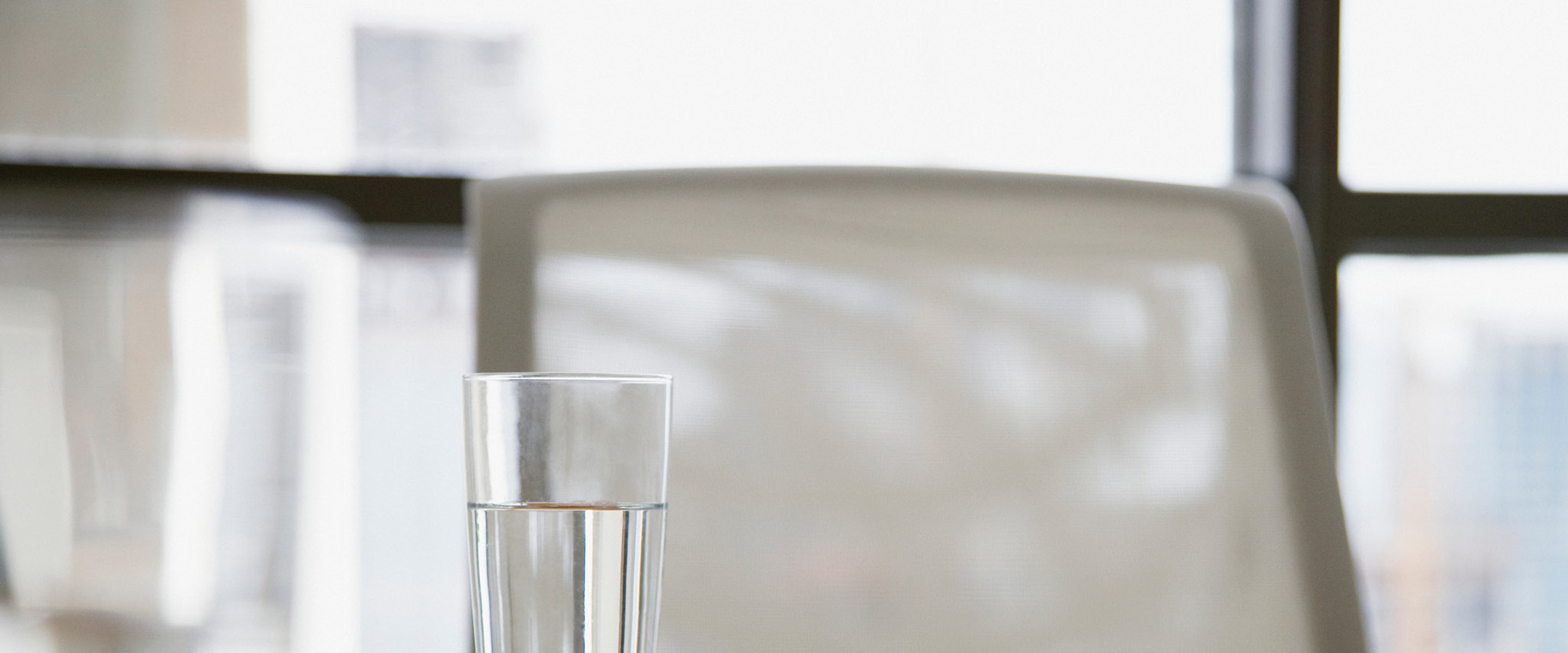 Glass of water on a desk