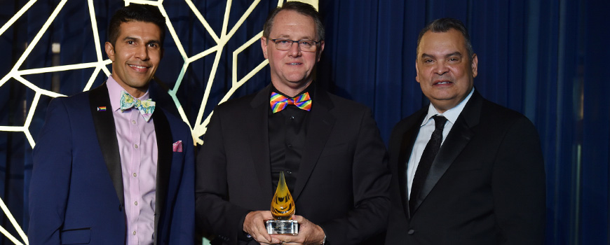 William Blair CEO Brent Gledhill (center) with Center on Halsted Board Officer Krishna Ramachadran (left) and CEO Modesto “Tico” Valle (right) at the Human First gala.  Photo Credit: Center on Halsted