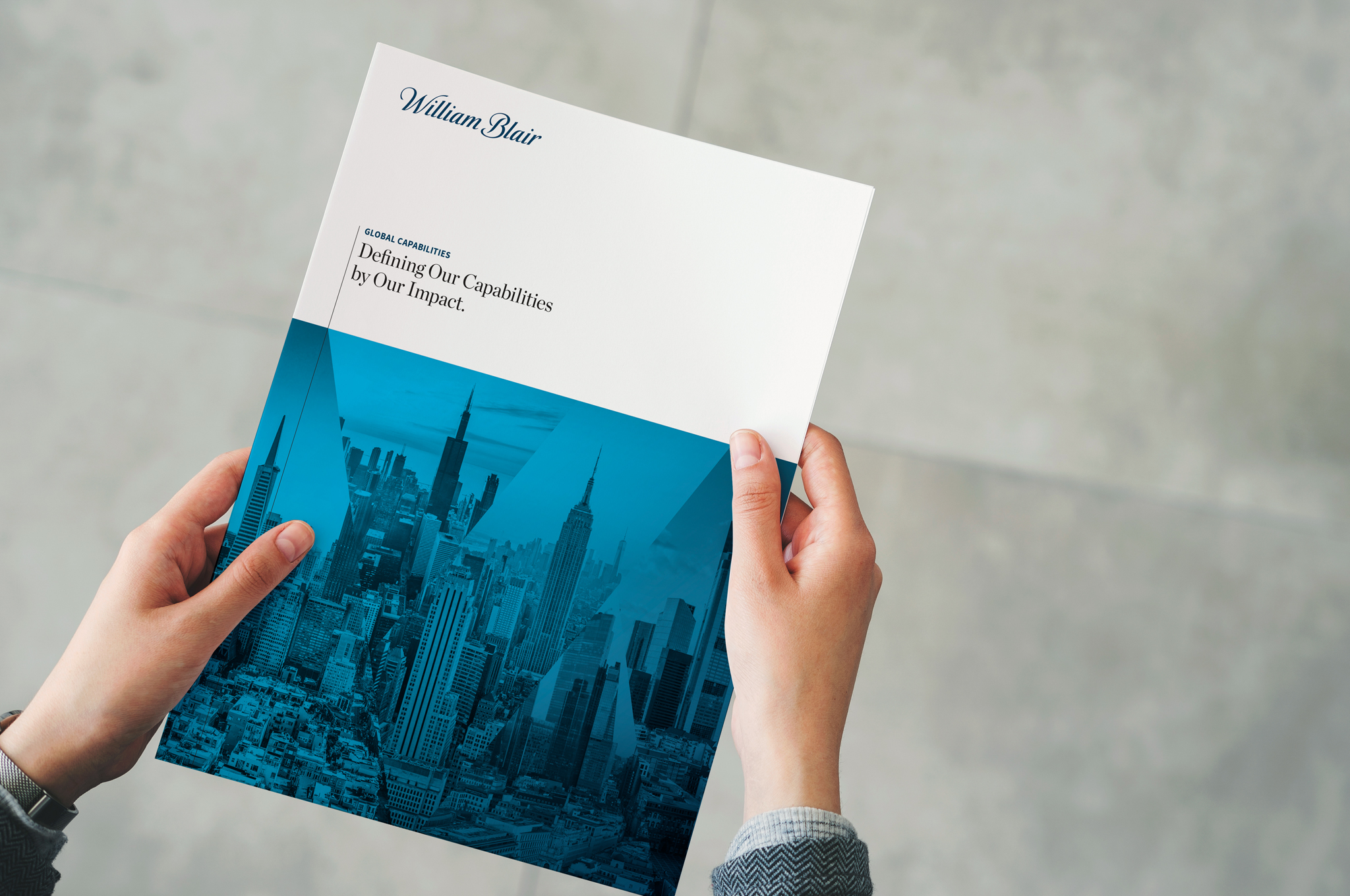 Corporate Capabilities Brochure in someone's hands